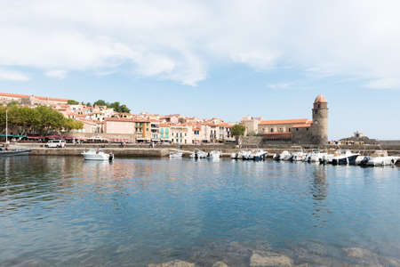 Old town of Collioure, France, a popular resort town on Mediterranean sea, view of the habor and churchの写真素材