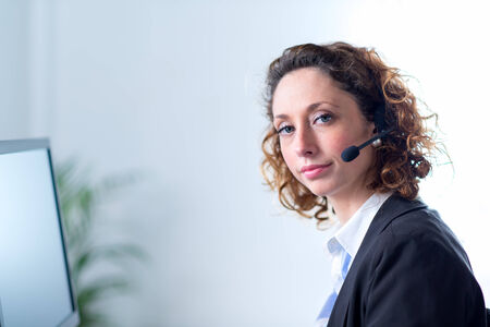 portrait of a beautiful young woman telephone operator