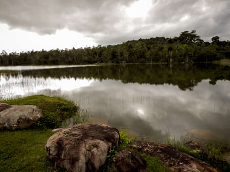 Lake view. Water reflecting sky.
