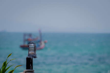 light post with light bulb near the beach in Koh-Lan, Thailand.の写真素材