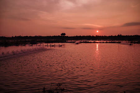 Sun set near shrimp poundの写真素材