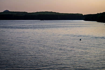 Sea with sun reflection on the surface of the waterの写真素材