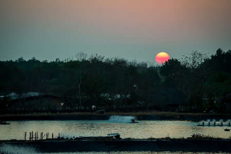 Sunset at shrimp farm in the south of Thailandの写真素材