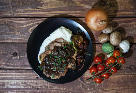Keto JÃ¤gerschnitzel with cauliflower puree and brussel sprouts with bacon.の写真素材