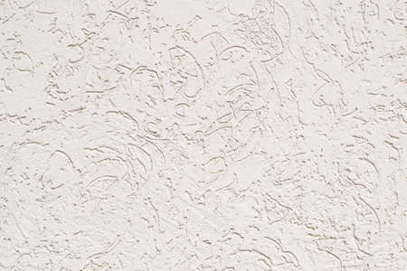 Close up photo of white cracked wallの写真素材