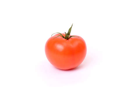 Close up front view photo of red raw fresh with perfect ideal flawless skin bright tomato isolated on white background copy-space copyspaceの写真素材