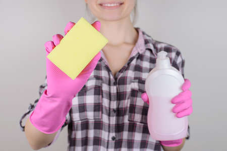 House keeping housecleaning dish concept. Close up photo of cheerful confident lady showing holding...