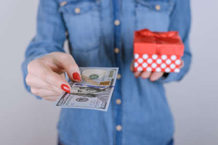 Sell people person charity donate income perks benefit give discount sale extra job work business entrepreneur chistmas concept. Cropped close up photo of happy lady with cash box isolated backgroundの写真素材