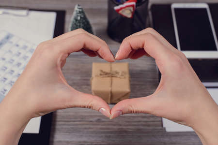 Pov above high angle first person view photo of beautiful lady hands make showing heart shape with...