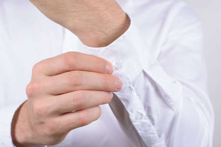 Unbutton beauty fashion elegance masculine virile concept. Cropped close up photo of serious...