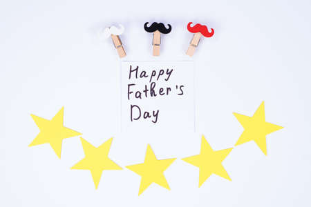 Happy father's day concept. Best dad concept. Photo of message with inscription and clothespins with...