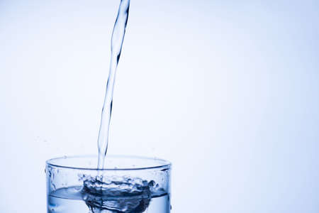 Drinking clean water concept. Cropped closeup photo picture of top of glass fresh pure tasty mineral...