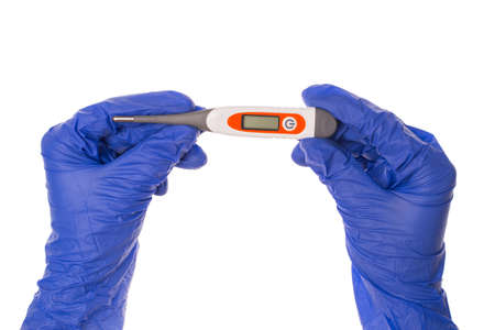 Top overhead above cropped close up photo of hands holding digital thermometer with empty display...