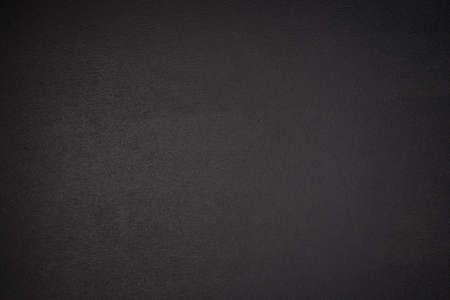 School concept. Close-up photo of clean black chalkboardの写真素材