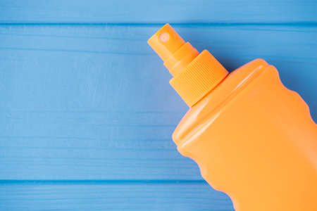 Sunbathing UV protection concept. Top above overhead view close-up photo of sunscreen isolated on...
