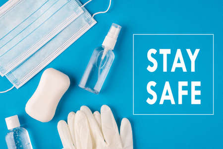 Sars-cov-2 outbreak concept. Top above overhead close up view photo of white face mask sanitize gel...