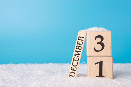 The last day of the year concept. Close up photo of calendar showing the 31 of december standing in...