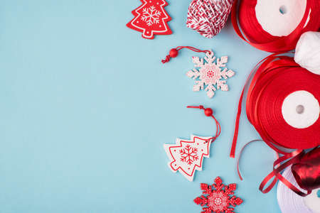 Preparing for Christmas concept. Top above overhead close up view photo of ribbon and rope for...