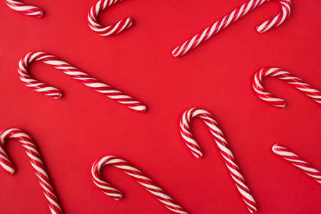 Close up top above overhead view photo image of candy canes isolated vivid color backgroundの写真素材
