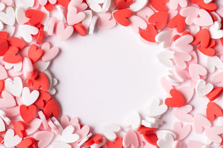 Top flatlay mock up close up view photo of cute heart in red pink and white colors making backdrop...