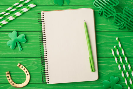 Flat lay top above overhead close up view photo picture of blank empty clear notebook with place for...