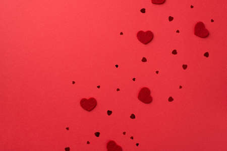 Top view photo of valentine's day decorations decorative hearts and heart shaped confetti on...