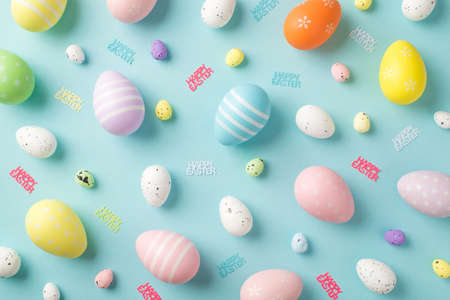 Top view photo of easter decorations inscriptions happy easter and multicolored eggs on isolated...
