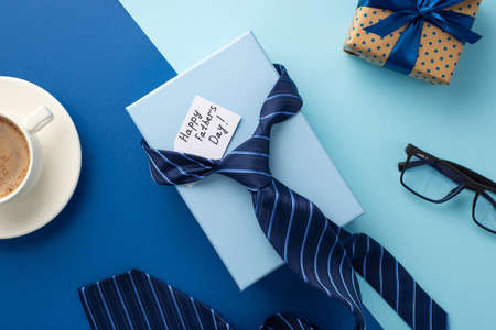 father's day concept. Top view photo of blue necktie gift boxes postcard glasses and cup of coffee...