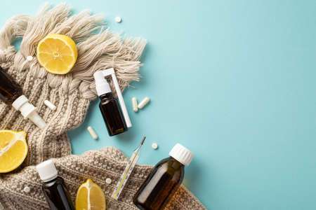 Seasonal diseases concept. Top view photo of spray and syrup transparent brown bottles pills...