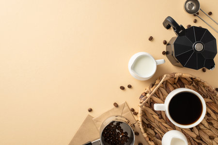 Commemorate Coffee Day with striking setup. Top view of scattered coffee beans, espresso cup within elegant wicker tray, milk, cream jars, etc on pastel beige surface, offering space for your messageの写真素材