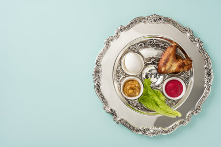 Passover Seder plate featuring traditional symbolic foods on an ornate dish for celebrationの写真素材