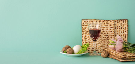 Elegant side view arrangement of traditional Passover foods including matzo, wine, nuts, and egg on...