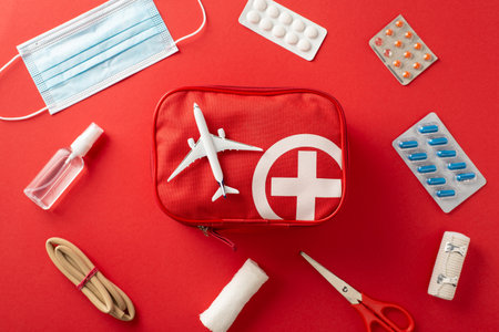 Portable first aid kit with essential medical supplies for use during travel and emergenciesの写真素材