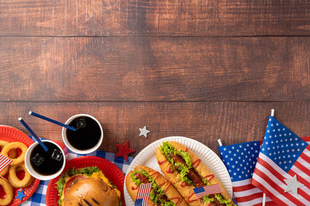Labor Day and Independence Day celebration with patriotic theme, featuring American dishes and decoration. A backyard party concept for family and friends with food and festive elementsの写真素材