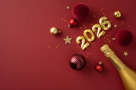 Festive composition featuring golden 2026 numerals with ornaments and sparkling champagne on red