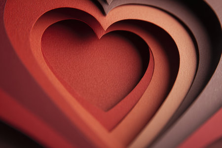 Close up of layered paper heart shapes in red and pink tones, forming soft curves and a warm, romantic abstract composition suitable for valentine or design projects. Generated A.I.の素材