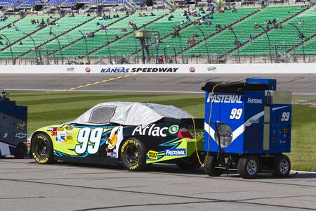 KANSAS CITY, KS - APR 22, 2012   The NASCAR Sprint Cup teams take to the track for the STP 400 at the Kansas Speedway in Kansas City, KS のeditorial素材
