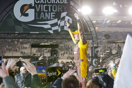 RICHMOND, VA - APR 28, 2012   Kyle Busch  18  holds off a hard charging field to win the Capital...