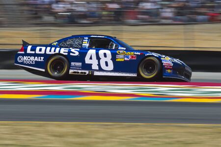 SONOMA, CA - JUN 24, 2012:  Jimmie Johnson (48) brings his car through the turns during the Toyota Save Mart 350 at the Raceway at Sonoma in Sonoma, CA.  のeditorial素材