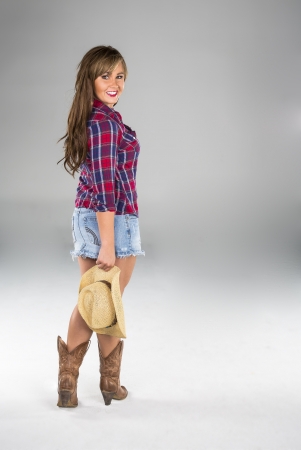 A beautiful blonde model posing in a studio environmentの写真素材