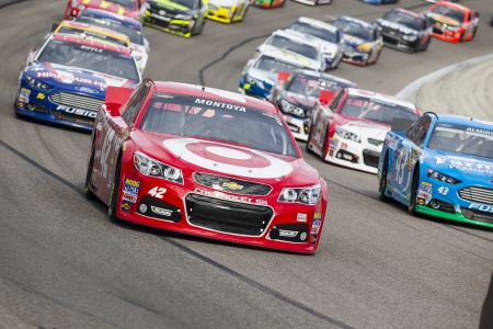 Ft Worth, TX - Nov 03, 2013:  Juan Pablo Montoya (42) brings his race car through the turns during the AAA Texas 500 race at the Texas Motor Speedway in Ft Worth, TX.のeditorial素材