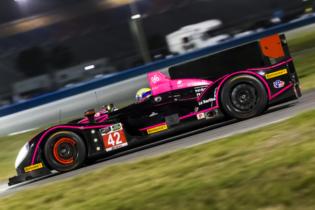 Daytona Beach, FL - Jan 04, 2014:  The Tudor United SportsCar Championship teams take to the track on Continental tires for a night practice for the Roar Before the Rolex 24 at Daytona International Speedway in Daytona Beach, FL.のeditorial素材