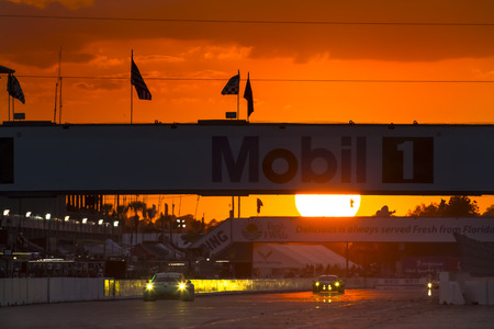 Sebring, FL - Mar 15, 2014:  The Tudor United SportsCar Championship teams take to the track at sunset for the 12 Hours of Sebring at Sebring International Raceway in Sebring, FL.のeditorial素材