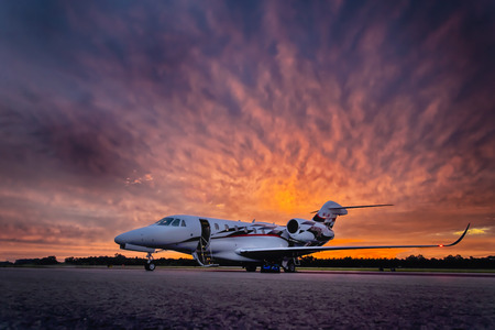 Concord, NC - May 18, 2014:  After finishing in 11th at the Sprint All Star Race, Kurt Busch (26) takes off at Concord Regional Airport to fly back to Indianapolis Motor Speedway for second round qualifying for the Indianapolis 500 IndyCar race in Indianaのeditorial素材