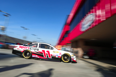 Fontana, CA - Mar 21, 2015:  Denny Hamlin (11) takes to the track to practice for the Auto Club 400 at Auto Club Speedway in Fontana, CA.のeditorial素材