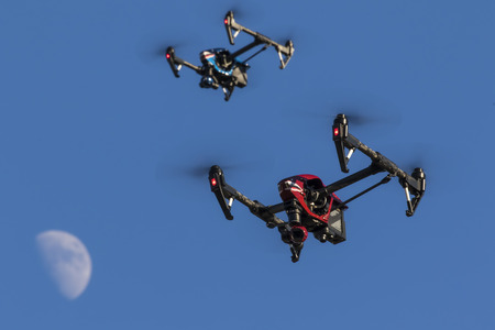 A personal drone flying through the airの写真素材