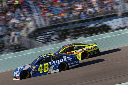 Homestead, FL - Nov 20, 2016: Jimmie Johnson (48) battles for position during the Ford EcoBoost 400 at the Homestead-Miami Speedway in Homestead, FL.のeditorial素材