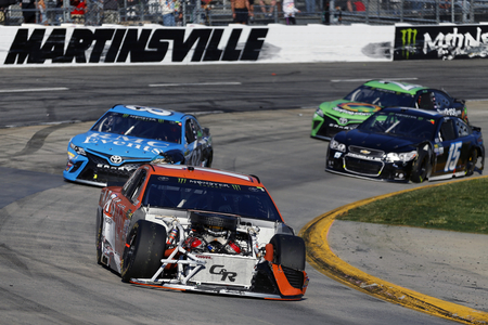April 02, 2017 - Martinsville, Virginia, USA: Daniel Suarez (19) races his damaged car during the STP 500 at Martinsville Speedway in Martinsville, Virginia.のeditorial素材