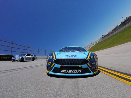 May 07, 2017 - Talladega, Alabama, USA: Ricky Stenhouse Jr. (17) and Dale Earnhardt Jr. (88) lead the pack to the green flag for the GEICO 500 at Talladega Superspeedway in Talladega, Alabama.のeditorial素材