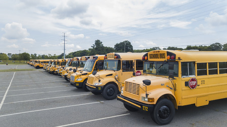 School buses prepare for another school year.のeditorial素材